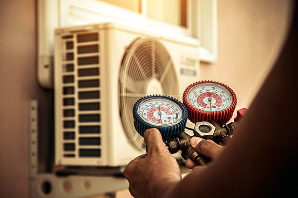 Professional Hvac technician working in Yadkinville, NC